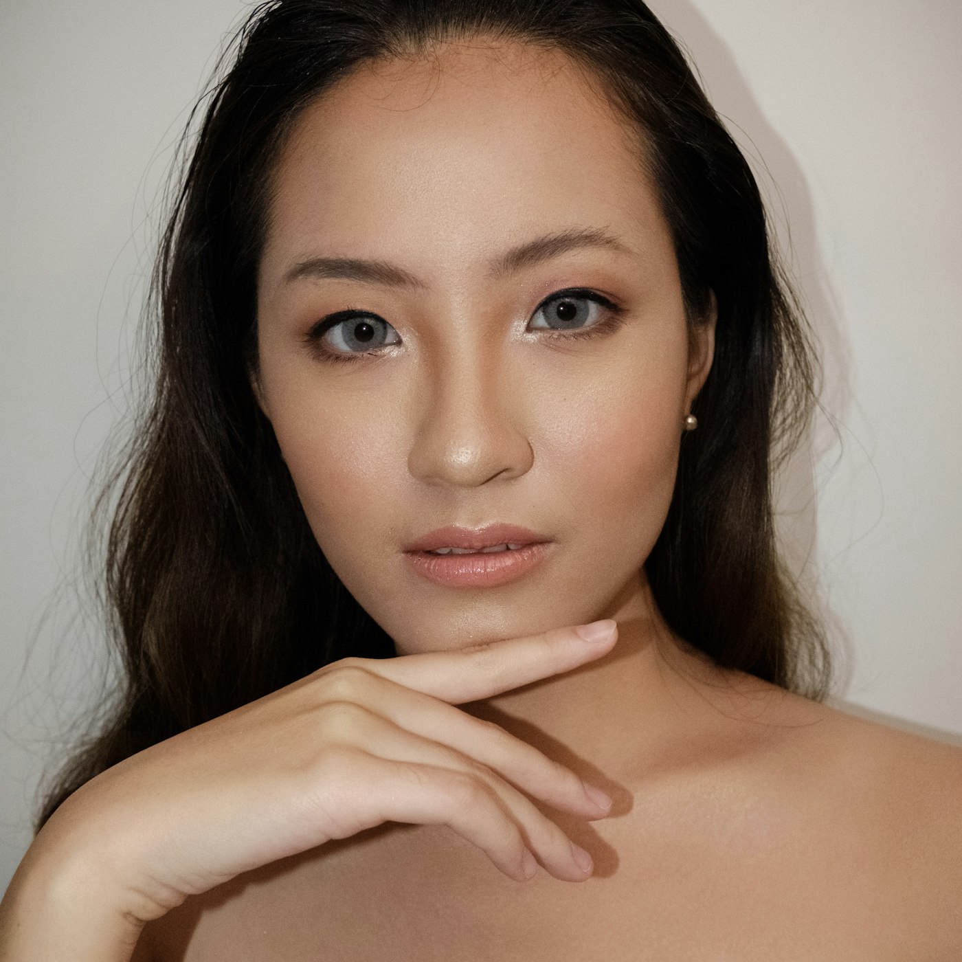 Editorial beauty portrait — soft warm light